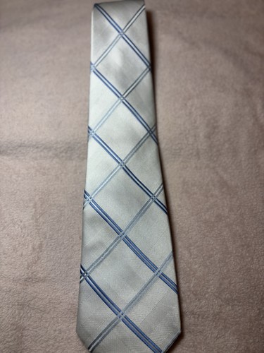 Next white blue diagonal strop - next,